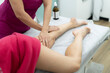 © Mihail - A skilled therapist provides a calming leg massage