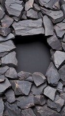 Poster - A captivating arrangement of stones creates a central opening, showcasing diverse textures and colors in striking detail against darkness