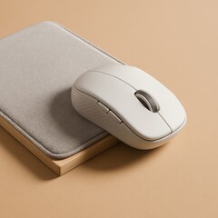 modern workspace essentials: an overhead shot showcases a minimalist computer mouse resting on a coo