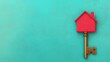 © Satisgitfied - Red House Key on Aquamarine Background for Real Estate Concept