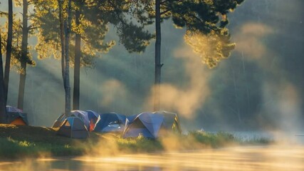 Poster - Morning Camp by the Lake: The serene scene of tents by a misty lake, with the soft sunlight filtering through the trees, evokes a sense of tranquility, ideal for any camping adventure.
