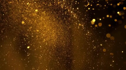Golden glitter particles abstract background with shiny bokeh and glowing effect floating with black backdrop for luxury concept