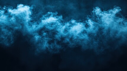 Canvas Print - Soft Blue Smoke Flowing in Dark Background with Ethereal Appearance