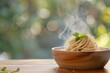 © Sladjana - freshly twirled pasta being served, with a dynamic shallow focus