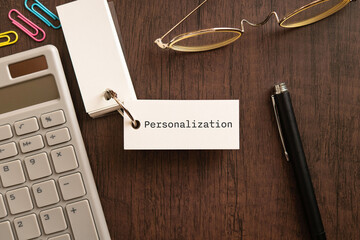 Poster - there is word card with the word personalization. it is as an eye-catching image.
