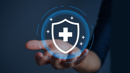 Poster - A hand holding a shield with a plus sign inside surrounded by blue circles and plus signs on a dark background