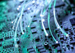 © Westend61 - Close-up of a circuit board with glowing fibre optics representing data and innovation in technology