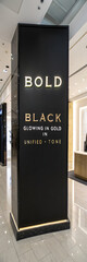 Fototapete - Nee a branding for a showroom piler 
set this latter
“Bold in
Black 
Glowing in
Gold 
Unified
in Tone”
need luxury font setup bold font is Gold and Black word
