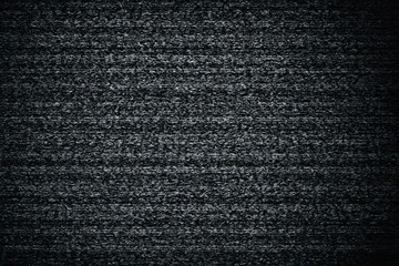 Poster - Textured Darkness: Capturing the subtle intricacies of a rough, dark texture in a monochromatic aesthetic, the image draws the viewer in with its contrast and depth. The image.