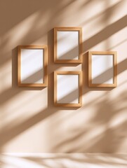 Poster - Four empty wooden picture frames arranged on a beige wall, casting shadows in a serene setting