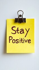 Poster - Stay Positive Vibrant Yellow Sticky Note with a Motivational Message on White Background.