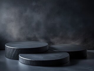 Wall Mural - three dark grey circular platforms, possibly stone, sit on a dark floor against a moody, smoky dark 