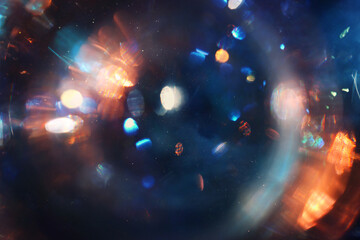 Wall Mural - background of dark lens flare lights. abstract image