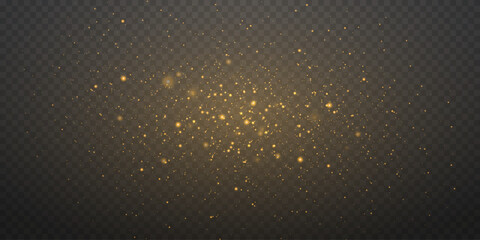 Golden glowing dust particles with soft shimmer effect. On transparent dark background.