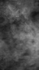 Wall Mural - Organic cloud of dust particles floating on black screen overlay in slow motion.