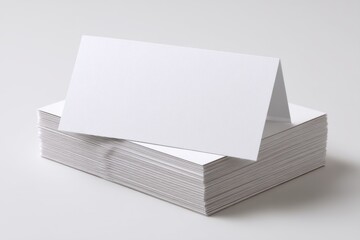 Poster - A stack of pristine white cards, ideal for invitations or business correspondence, featuring a blank card for customizable text and graphics, perfect for mockups and presentations.