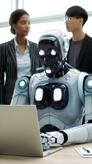 Poster - Futuristic robot working on laptop with colleagues in modern office environment