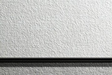 Poster - Textured wall with a horizontal black line against a light background in an indoor setting during daylight hours
