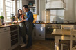 © Wavebreak Media - Asian couple cooking together in cozy kitchen, enjoying quality time, copy space