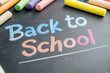 © photo for everything - A chalkboard with colorful chalks announcing: 'Back to School'. A nostalgic reminder of education, learning, and a fresh start in an academic setting.