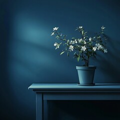 Poster - Discover Tranquility With a Blooming White Flower Pot Against a Deep Blue Wall in a Serene Indoor Setting at Dusk