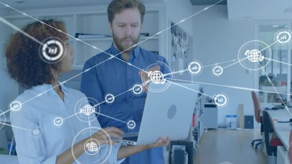 Poster - Woman analyzing tech data on laptop while man watching as network graph expanding across office