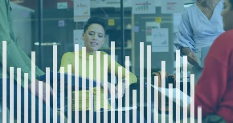 Poster - Mid adult woman scanning report after colleague offering chart noting detail in business meeting