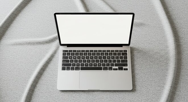 Laptop blank screen on gray surface