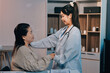 © ARMMY PICCA - Medicine doctor hand reassuring her female patient