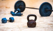 © Volodymyr - Sports equipment. Kettlebell, barbell and dumbbells for summer sport. Outdoor sport. Fitness workout in public sport gym. Lifting weights. Healthy lifestyle. Fitness outdoors. Sport background.