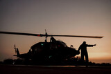 helicopter at sunset