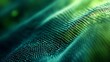 © Kanok - Abstract futuristic technology background with a flowing digital wave of green and blue particles forming a complex grid structure