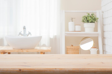 Wall Mural - bleached wood table top for product montage on blurred bathroom window and shelf interior background