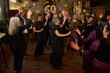 © Christina - People attending dance show at 60th birthday party at nightclub