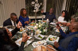 © Christina - Group of friends having dinner while celebrating silver wedding anniversary