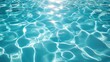 © crazyass - Abstract water background rippling waves and light reflections in calming blue tones