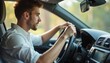 © natakot - Focused man driving a car