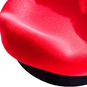 A close up shot showcasing a vibrant red object with a smooth texture against a dark background element isolated with white background