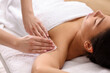 © New Africa - Woman undergoing wax epilation procedure indoors, closeup