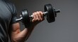 © Neo GT - Muscular Male Hands Lifting Dumbbell During Workout Session. Gym background for poster and banner design. Man lifting dumbbell for bicep curl exercise strength training fitness workout