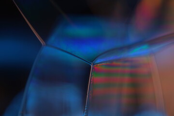 Leinwandbilder - Bright blue liquid surface on black background, oil stains movement, bright chemistry, surreal background, blue sky colour, connection lines