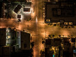 © AmazingAerialAgency - Aerial view of illuminated urban landscape with busy streets and vibrant city lights, Old Pasadena, California, United States.