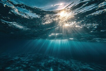 Poster - Underwater Sunlight Rays Filtering Through Ocean Surface Low Angle View in Tropical Sea Paradise
