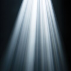 Poster - Dramatic spotlight shining down from above on dark background studio shot abstract light rays illumination