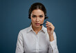 © Dhrubo - A smiling female customer service representative with a headset provides support at a call center