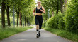 © Zulharyono - A woman with a prosthetic leg is jogging on the city's green path.