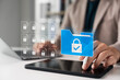 © Thapana_Studio - Secure data management concept with businessman using tablet. Locked digital folder and documents represent cybersecurity, file protection, privacy policy, and safe information storage.