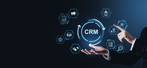 Poster - CRM system concept with business icons and businessman hand interacting through digital interface on dark blue gradient background in modern style.