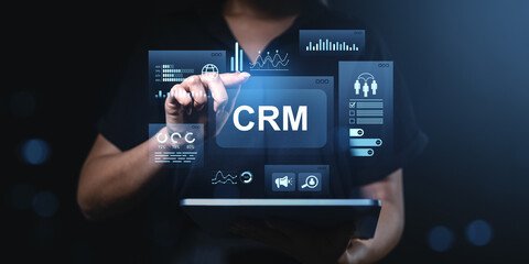 Poster - Businessperson interacting with CRM interface on tablet with digital data charts and communication icons floating in futuristic technology concept.