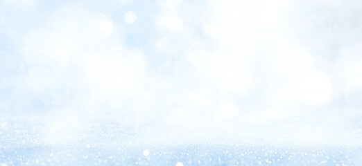 Poster - Subtle and soft winter wonderland scene depicting a glistening snow covered ground and a light blur sky suitable for holiday designs.